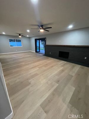 Empty room, Fireplace, Interior, Recessed Lighting, Wood Texture Flooring