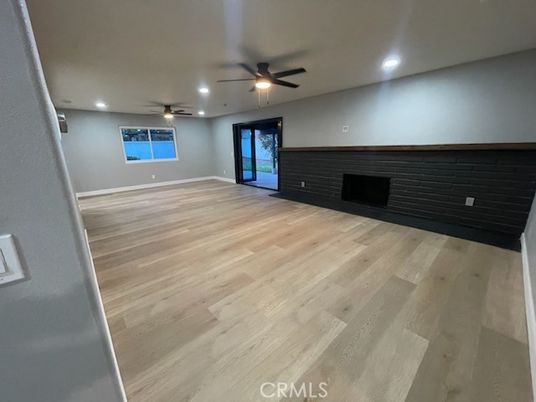 Empty room, Fireplace, Interior, Recessed Lighting, Wood Texture Flooring