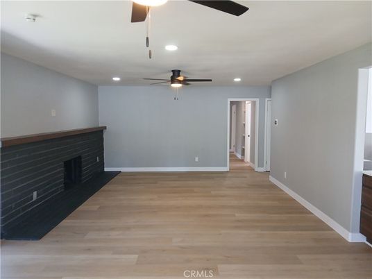 Empty room, Fireplace, Interior, Recessed Lighting, Wood Texture Flooring
