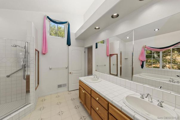 Bathroom, Dual Sink Vanities, Glass Shower, Interior, Recessed Lighting, Tile Countertops