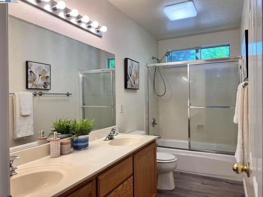 Bathroom, Dual Sink Vanities, Glass Shower, Interior, Wood Texture Flooring