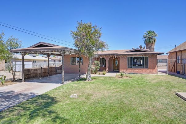 Attached, Backyard, Exterior, Facade, Brick Facade, Mediterranean