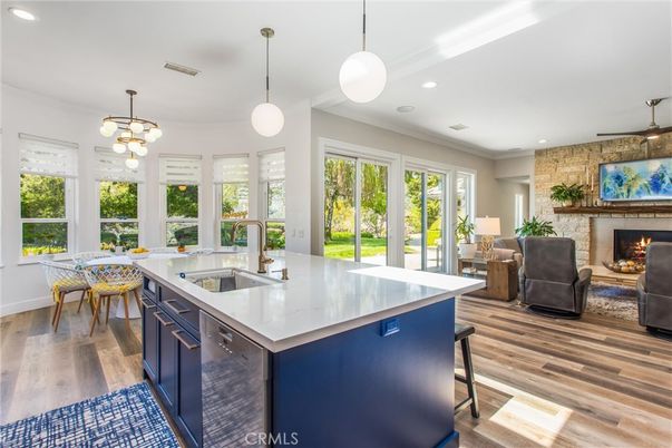 Dining room, Fireplace, Interior, Kitchen, Living room, Pendant Lights, Recessed Lighting, Stone Walls, Wood Texture Flooring