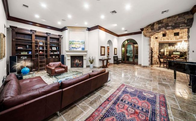 Dining room, Fireplace, Interior, Living room, Piano, Recessed Lighting, Stone Walls