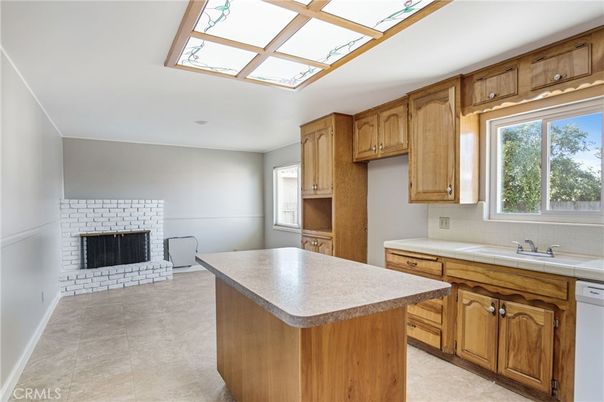 Fireplace, Interior, Kitchen, Recessed Lighting, Tile Countertops