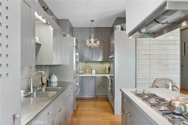 Chandelier, Interior, Kitchen, Pendant Lights, Stainless Steel Appliances, Wood Texture Flooring