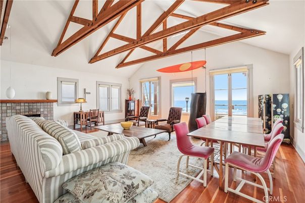 Dining room, Fireplace, Interior, Living room, Pendant Lights, Water, Wooden Beams, Wood Texture Flooring