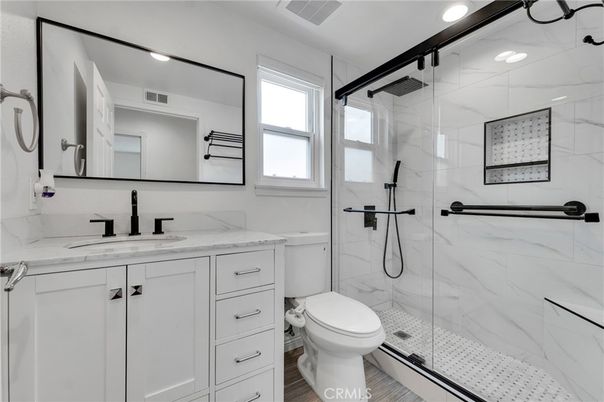 Bathroom, Glass Shower, Interior, Marble Walls, Recessed Lighting, Wood Texture Flooring