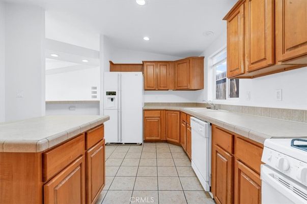 Interior, Kitchen, Recessed Lighting, Tile Countertops