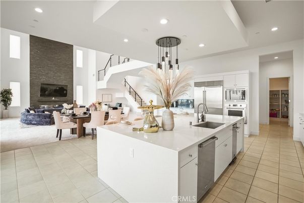 Dining room, Fireplace, Interior, Kitchen, Living room, Pendant Lights, Recessed Lighting, Stainless Steel Appliances