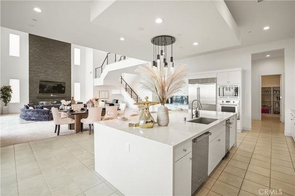 Dining room, Fireplace, Interior, Kitchen, Living room, Pendant Lights, Recessed Lighting, Stainless Steel Appliances
