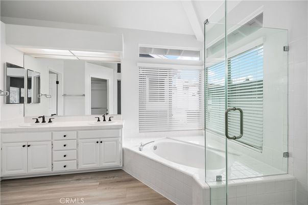 Bathroom, Dual Sink Vanities, Glass Shower, Interior, Wood Texture Flooring