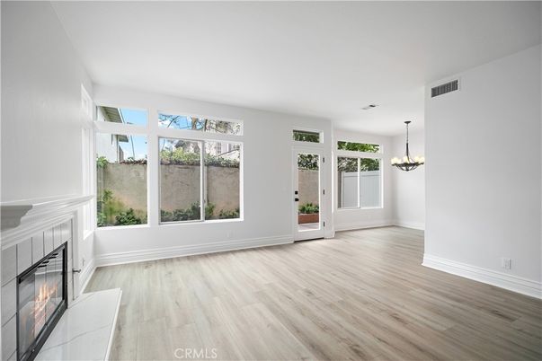 Chandelier, Empty room, Fireplace, Interior, Pendant Lights, Wood Texture Flooring