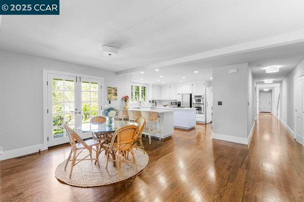 Dining room, Interior, Kitchen, Recessed Lighting, Stainless Steel Appliances, Wood Texture Flooring