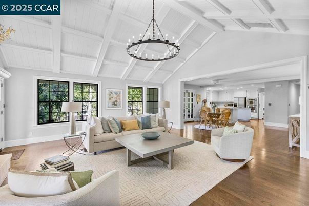 Chandelier, Dining room, Interior, Kitchen, Living room, Pendant Lights, Recessed Lighting, Stainless Steel Appliances, Wood Texture Flooring