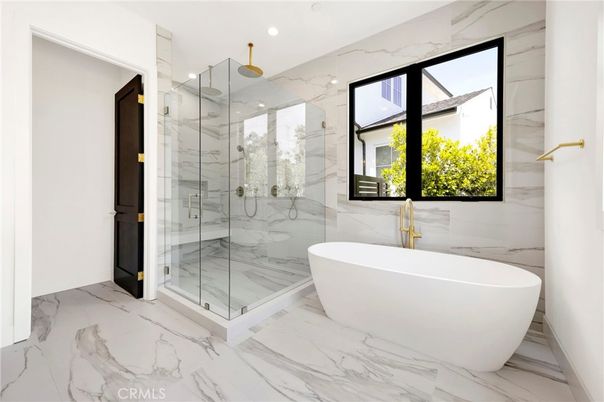 Bathroom, Free Standing Baths, Glass Shower, Interior, Marble, Marble Walls, Recessed Lighting