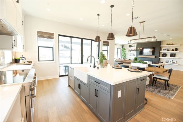 Dining room, Interior, Kitchen, Pendant Lights, Recessed Lighting, Stainless Steel Appliances, Wood Texture Flooring