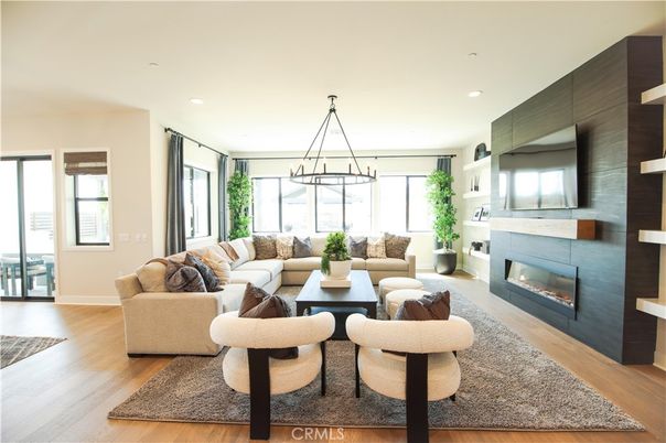 Dining room, Fireplace, Interior, Living room, Pendant Lights, Recessed Lighting, Wood Texture Flooring