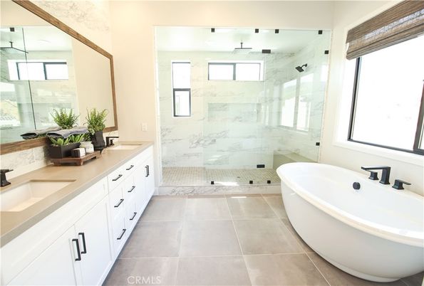 Bathroom, Dual Sink Vanities, Free Standing Baths, Glass Shower, Interior, Marble Walls
