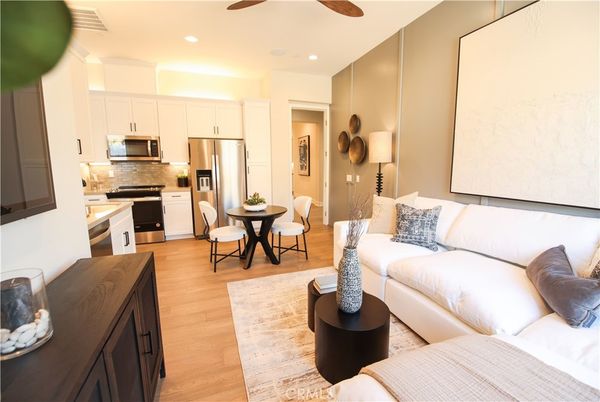 Dining room, Interior, Kitchen, Living room, Recessed Lighting, Stainless Steel Appliances, Wood Texture Flooring