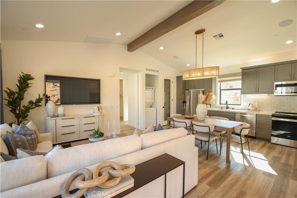 Dining room, Interior, Kitchen, Living room, Pendant Lights, Recessed Lighting, Stainless Steel Appliances, Wooden Beams, Wood Texture Flooring