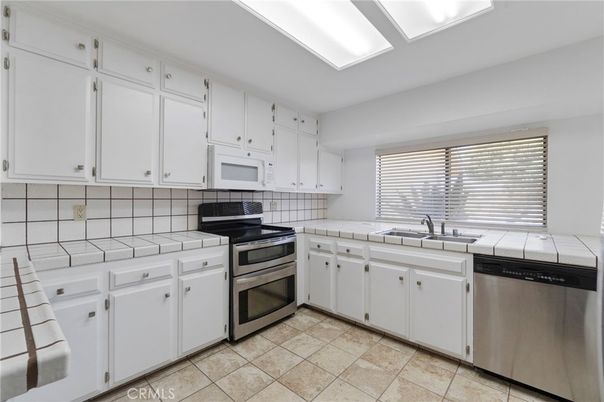 Interior, Kitchen, Stainless Steel Appliances, Tile Countertops