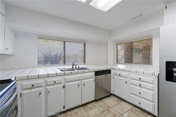 Interior, Kitchen, Stainless Steel Appliances, Tile Countertops