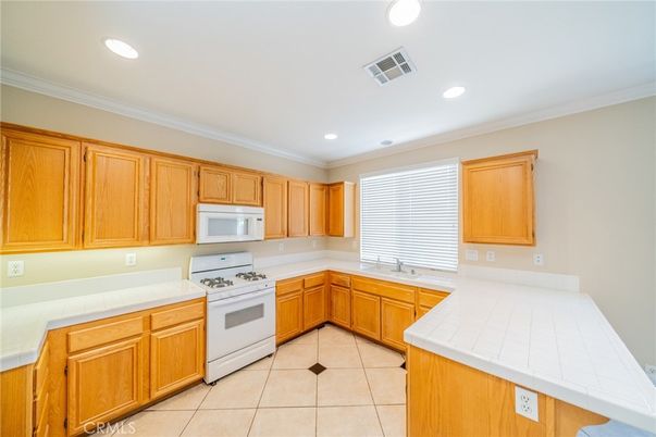 Interior, Kitchen, Recessed Lighting, Tile Countertops