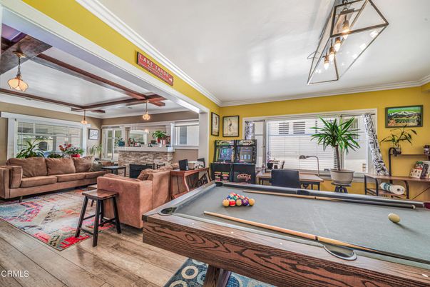 Billiard Table, Fireplace, Game Room, Interior, Living room, Pendant Lights, Stone Walls, Wood Texture Flooring
