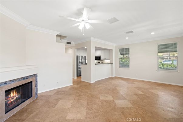Empty room, Fireplace, Interior, Kitchen, Recessed Lighting, Stainless Steel Appliances