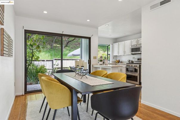Dining room, Interior, Kitchen, Recessed Lighting, Stainless Steel Appliances, Wood Texture Flooring