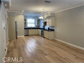Chandelier, Interior, Kitchen, Pendant Lights, Recessed Lighting, Stainless Steel Appliances, Wood Texture Flooring