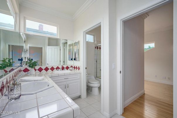 Bathroom, Dual Sink Vanities, Interior, Tile Countertops, Wood Texture Flooring