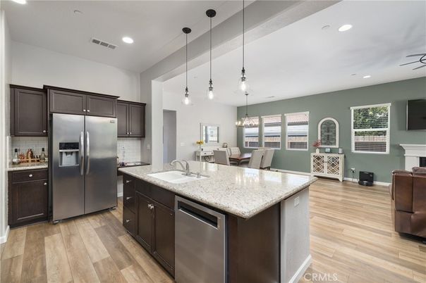 Dining room, Interior, Kitchen, Pendant Lights, Recessed Lighting, Stainless Steel Appliances, Wood Texture Flooring