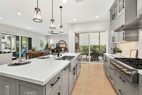Dining room, Interior, Kitchen, Living room, Pendant Lights, Recessed Lighting, Stainless Steel Appliances, Wood Texture Flooring