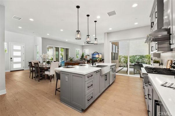 Dining room, Interior, Kitchen, Pendant Lights, Recessed Lighting, Stainless Steel Appliances, Wood Texture Flooring