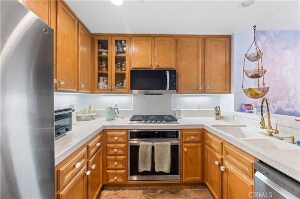 Interior, Kitchen, Recessed Lighting, Stainless Steel Appliances, Tile Countertops