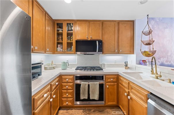 Interior, Kitchen, Recessed Lighting, Stainless Steel Appliances, Tile Countertops