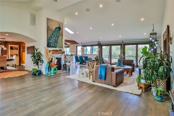 Dining room, Fireplace, Interior, Living room, Pendant Lights, Recessed Lighting, Wood Texture Flooring