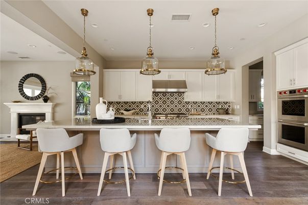 Fireplace, Interior, Kitchen, Pendant Lights, Recessed Lighting, Stainless Steel Appliances, Wood Texture Flooring