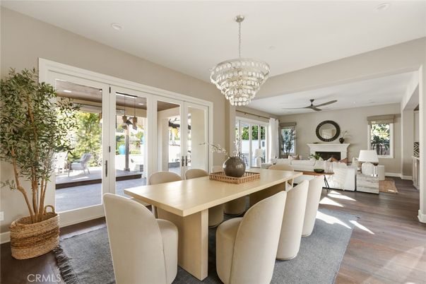 Chandelier, Dining room, Fireplace, Interior, Living room, Recessed Lighting, Wood Texture Flooring