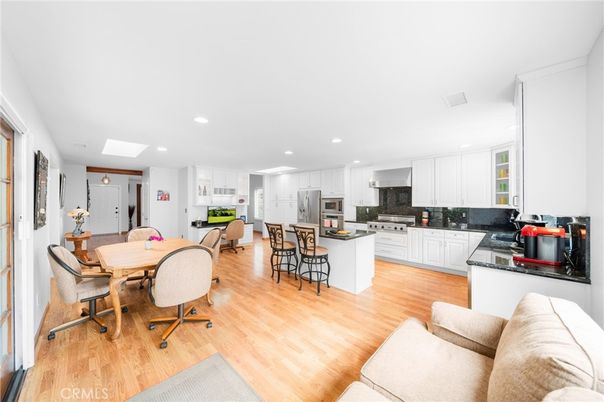 Dining room, Interior, Kitchen, Recessed Lighting, Stainless Steel Appliances, Wood Texture Flooring