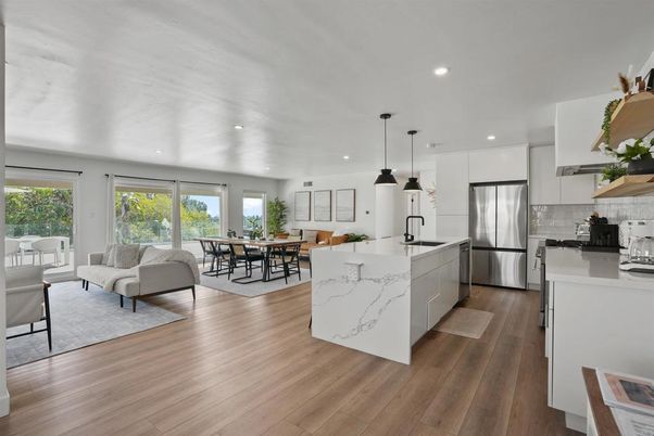 Dining room, Interior, Kitchen, Pendant Lights, Recessed Lighting, Stainless Steel Appliances, Wood Texture Flooring