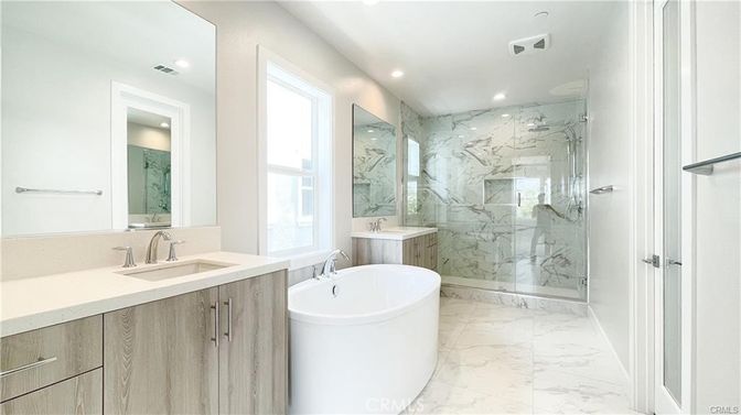 Bathroom, Dual Sink Vanities, Free Standing Baths, Glass Shower, Interior, Marble, Marble Walls, Recessed Lighting