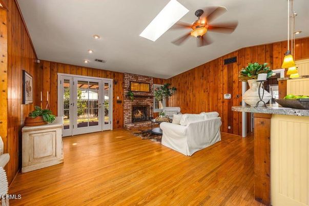 Fireplace, Interior, Living room, Recessed Lighting, Wood Texture Flooring, Wooden Walls