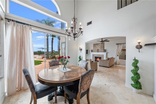 Chandelier, Dining room, Fireplace, Interior, Living room