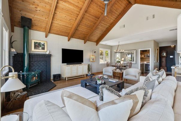 Chandelier, Dining room, Fireplace, Interior, Living room, Pendant Lights, Wooden Beams, Wooden Ceilings, Wood Texture Flooring