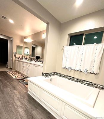 Bathroom, Dual Sink Vanities, Interior, Recessed Lighting, Wood Texture Flooring