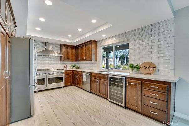 Interior, Kitchen, Recessed Lighting, Stainless Steel Appliances, Stone Walls, Wood Texture Flooring