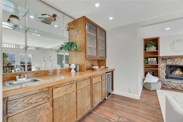 Fireplace, Interior, Kitchen, Recessed Lighting, Wood Texture Flooring